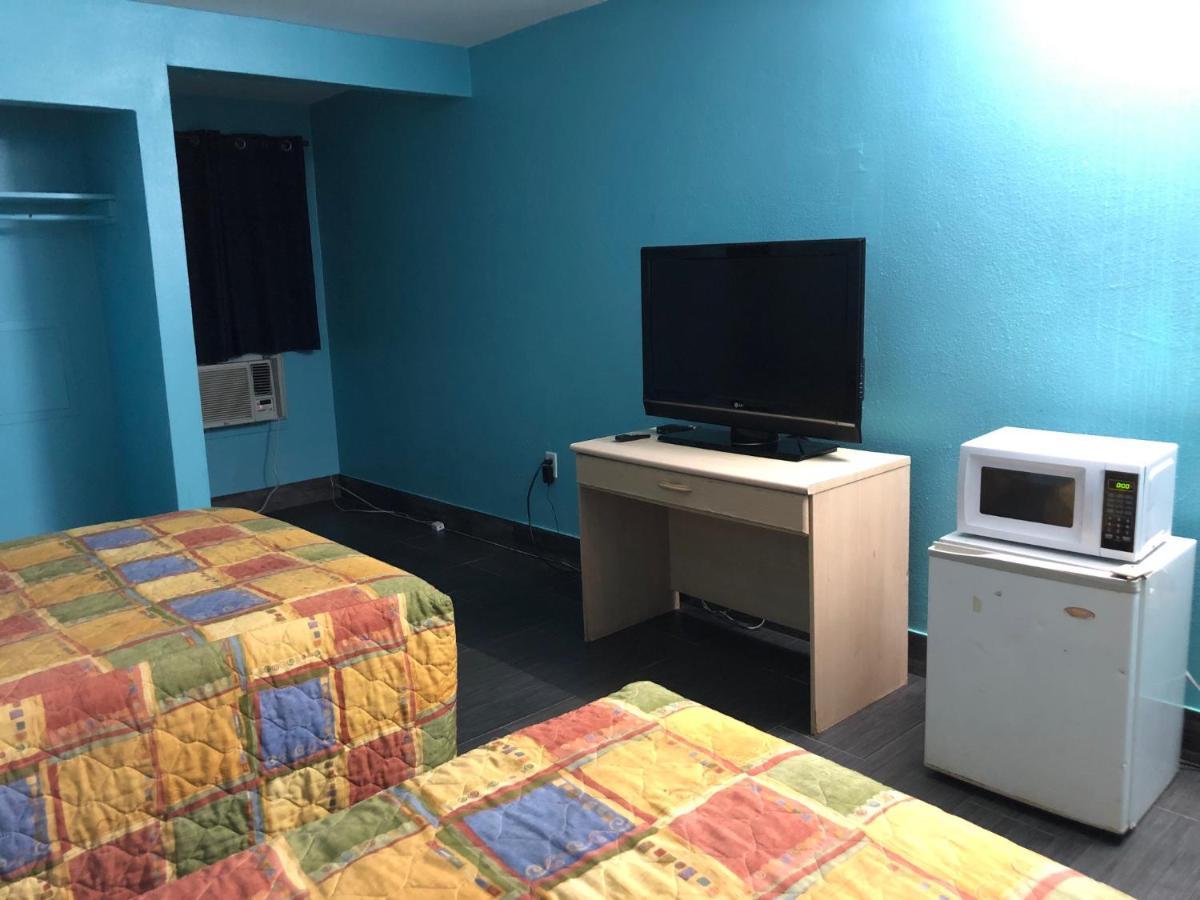 Slumberland Motel Sanford Bagian luar foto
